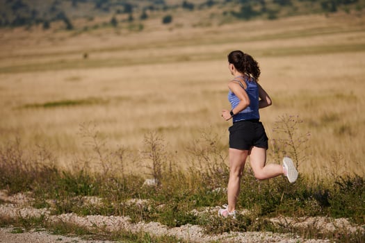 Solo Stride. Determined Athlete Woman Embarks on Fitness Journey for Marathon Preparation. photo