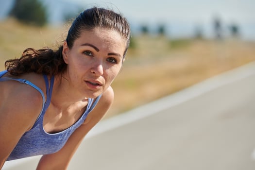 Close-Up Portrait of Determined Athlete Resting After Intense Workout photo