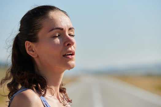 Close-Up Portrait of Determined Athlete Resting After Intense Workout photo