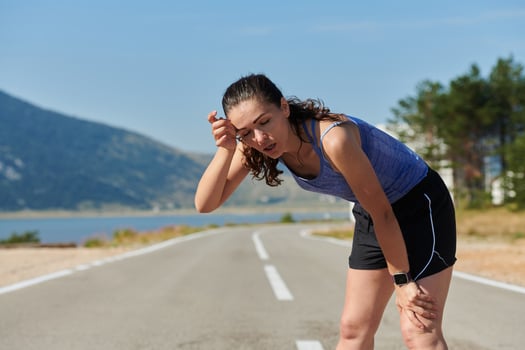 Close-Up Portrait of Determined Athlete Resting After Intense Workout photo
