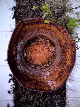 A rusty iron bucket photo