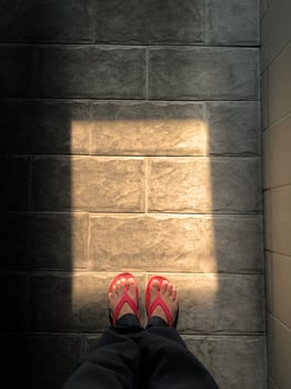Tiles with natural rock textures under the sun light through the window photo