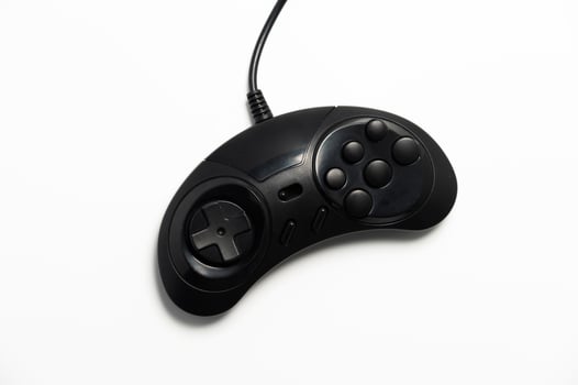 Old classic gamepad of arcade game consoles from the eighties photo