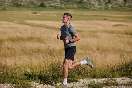 Determined Stride. Athletic Man Embarks on Marathon Preparation with Resolve. photo