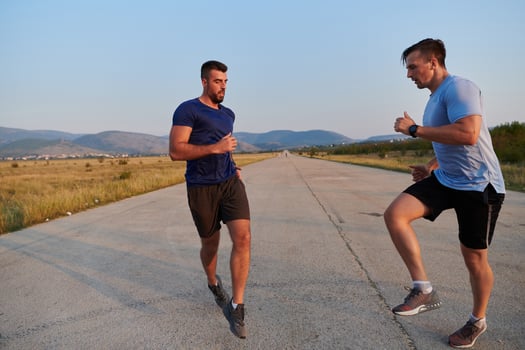 Marathon Partners. Two Athletic Friends Training Together for Upcoming Competition. photo