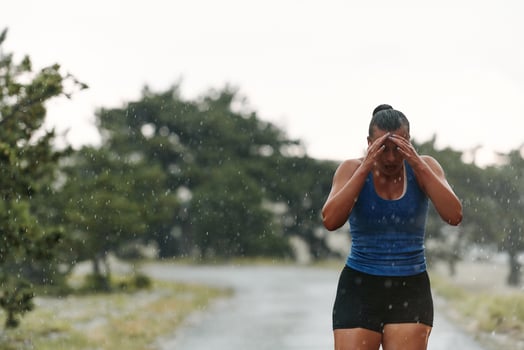 Unstoppable. A Determined Athlete Trains Through the Rain in Pursuit of Marathon Glory photo