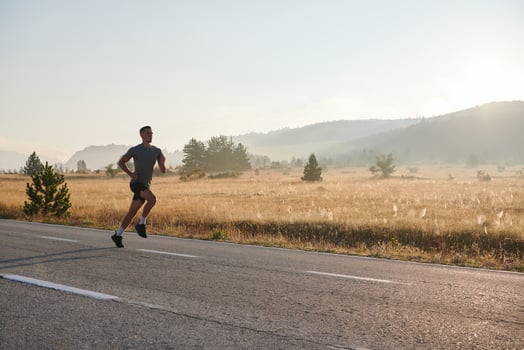 Determined Stride. Athletic Man Embarks on Marathon Preparation with Resolve. photo