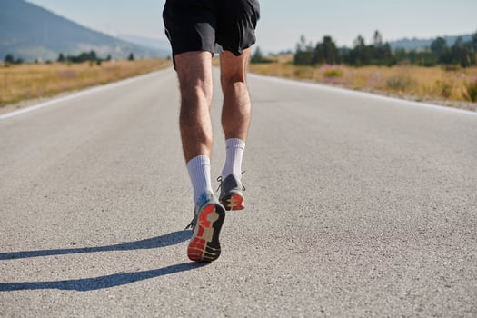 A dedicated marathon runner pushes himself to the limit in training. photo