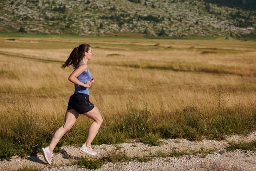 Solo Stride. Determined Athlete Woman Embarks on Fitness Journey for Marathon Preparation. photo
