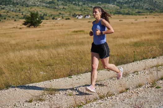 Solo Stride. Determined Athlete Woman Embarks on Fitness Journey for Marathon Preparation. photo
