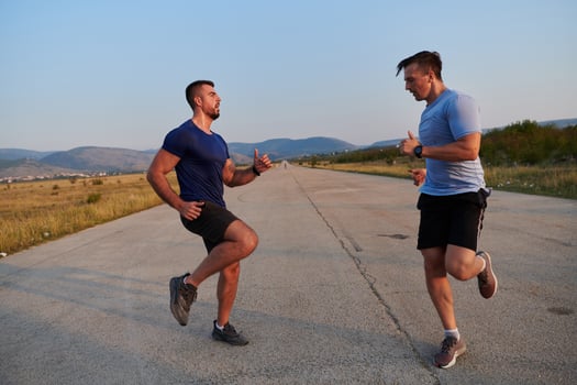 Marathon Partners. Two Athletic Friends Training Together for Upcoming Competition. photo