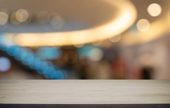 Empty wood table top and blur of out door garden background Empty wooden table space for text marketing promotion. blank wood table copy space for background photo