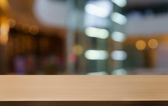Empty wood table top and blur of out door garden background Empty wooden table space for text marketing promotion. blank wood table copy space for background photo