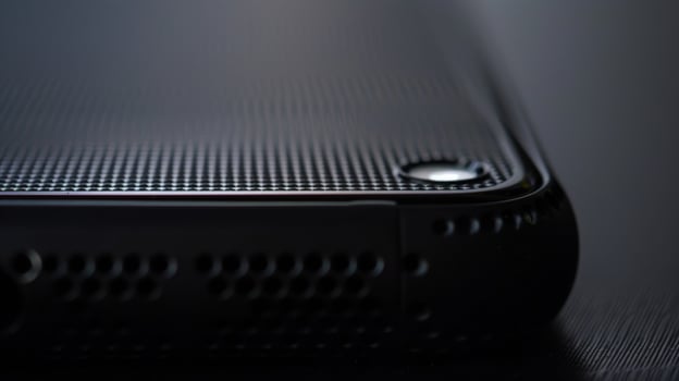 The texture of the casing is smooth but with a subtle raised grid pattern adding a touch of sophistication to the gadgets design photo