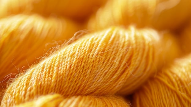 A closeup of a skein of yarn featuring bright yellow threads that emit a soft glow in low light photo