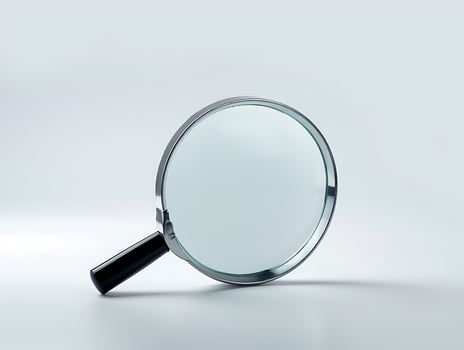 Magnifying glass on white background photo
