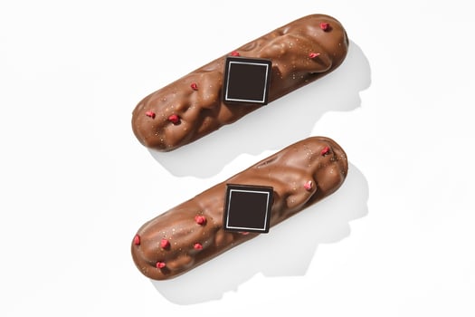 Milk chocolate-covered pecan bars with dried berries photo