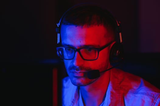 Handsome young male software developer programming codes while working from home photo