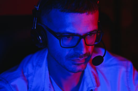 Handsome young male software developer programming codes while working from home photo