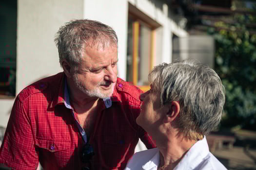 Affectionate Senior Couple Sharing a Moment of Intimate Conversation photo