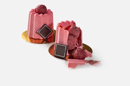 Dessert with Belgian chocolate shell encasing berry truffle candies photo