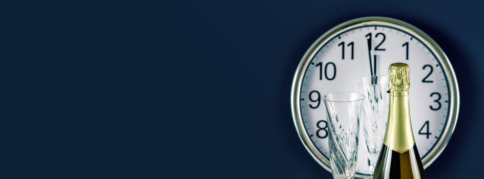 New Year banner with clock, bottle of champagne and two glasses photo