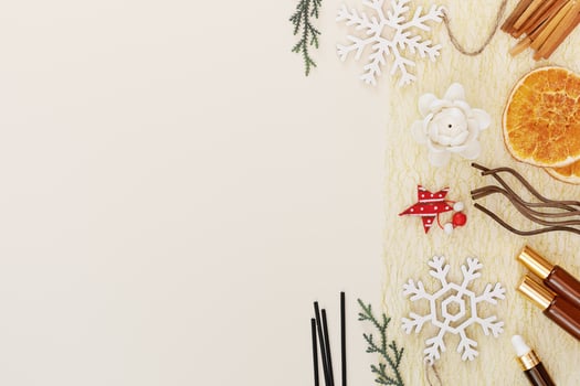 Aroma sticks, natural oils, dry fruits, sandalwood sticks and holiday decorations photo