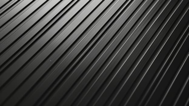 The texture of a control panel embossed with a series of diagonal lines in varying depths resulting in a sleek and modern design photo