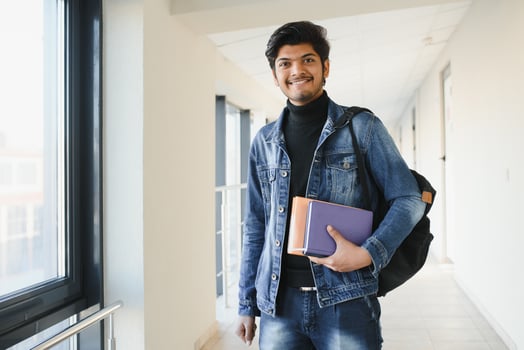 Handsome and young indian Male college student. photo