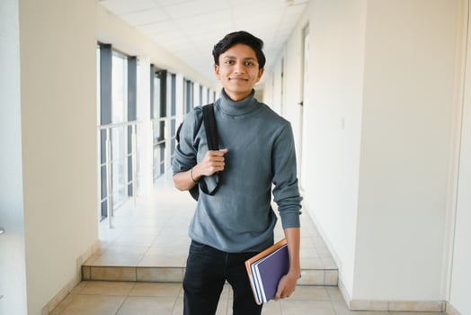 Handsome and young indian Male college student. photo