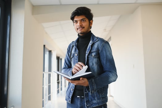 Handsome and young indian Male college student. photo