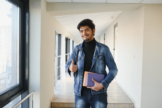 Handsome and young indian Male college student. photo