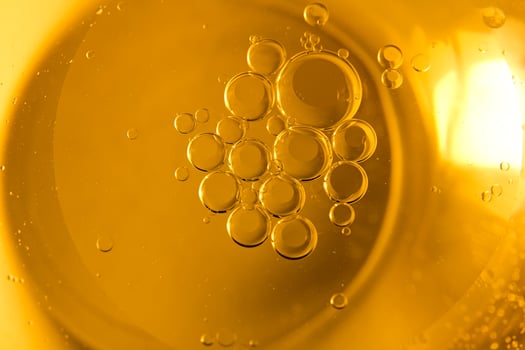 Cooking oil, cooking background, yellow oil drops and water kitchen. photo