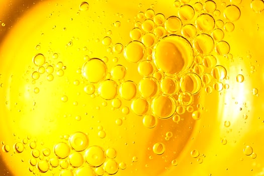 Cooking oil, cooking background, yellow oil drops and water kitchen. photo