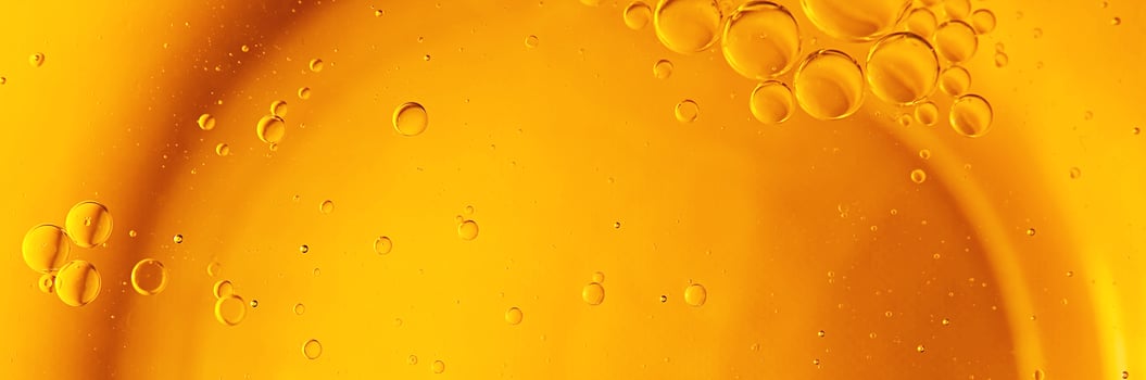 Cooking oil, cooking background, yellow oil drops and water kitchen. photo