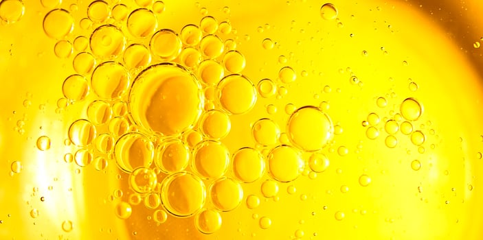 Cooking oil, cooking background, yellow oil drops and water kitchen. photo