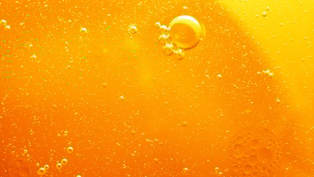 Yellow bubbles background, cooking oil emulsion, frying. photo