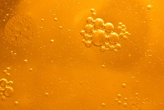 Yellow bubbles background, cooking oil emulsion, frying. photo