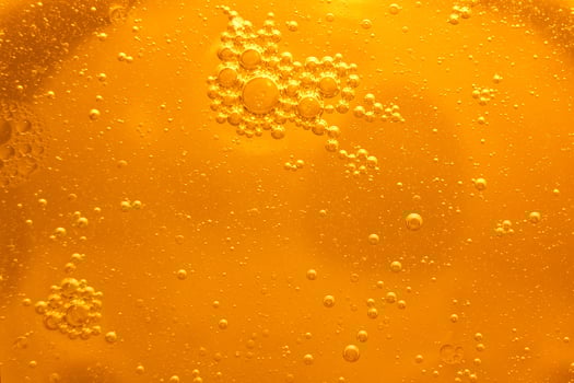 Yellow bubbles background, cooking oil emulsion, frying. photo
