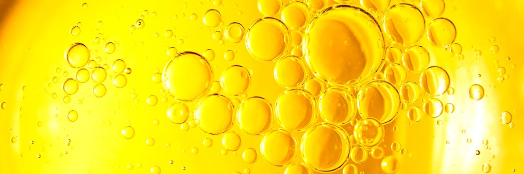 Yellow bubbles background, cooking oil emulsion, frying. photo