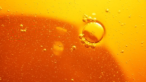 Yellow bubbles background, cooking oil emulsion, frying. photo