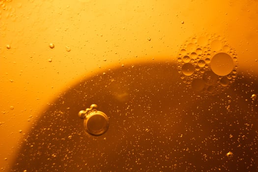 Yellow bubbles background, cooking oil emulsion, frying. photo