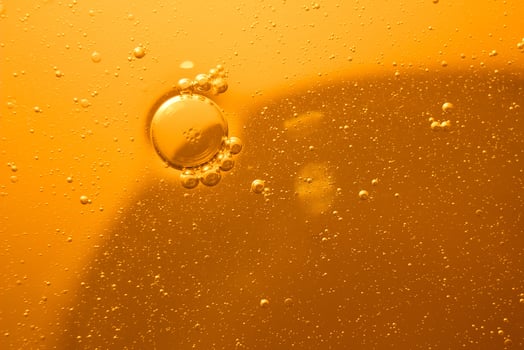 Yellow bubbles background, cooking oil emulsion, frying. photo