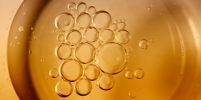 Yellow bubbles background, cooking oil emulsion, frying. photo