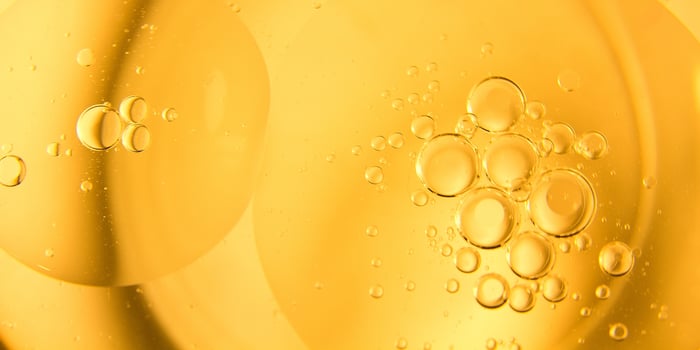 Yellow bubbles background, cooking oil emulsion, frying. photo