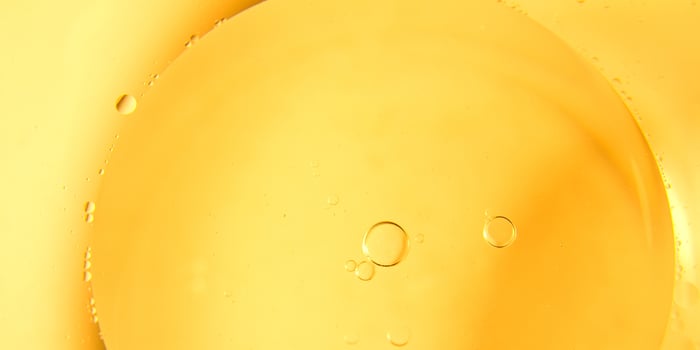 Yellow bubbles background, cooking oil emulsion, frying. photo