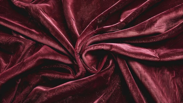 Burgundy plush velvet A deep and inviting burgundy fabric with a thick plush texture that looks both regal and inviting like a cozy winter night photo