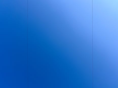 Wires against the blue sky. Gradient of the blue morning sky. Copy text photo