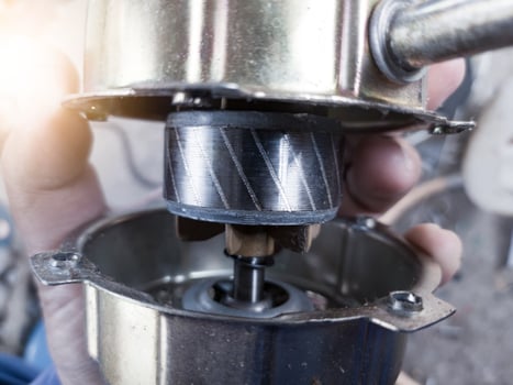 Checking the rotor on the cooling fan winding housing. photo
