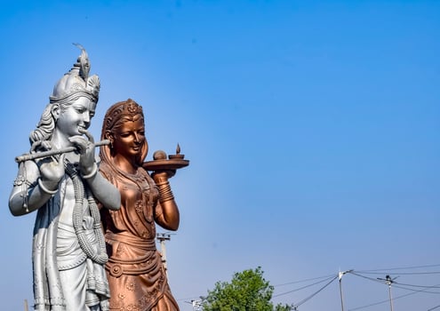 Big statue of Lord Radha Krishna near Delhi International airport, Delhi, India, Lord Krishna and Radha big statue touching sky at main highway Mahipalpur, Delhi photo